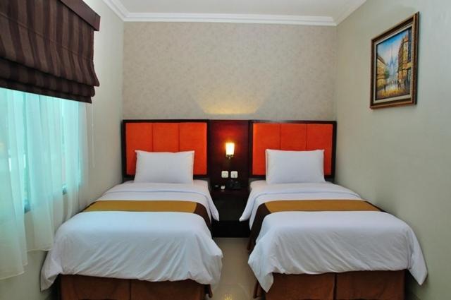 Feodora Airport Hotel Palembang Habitación foto