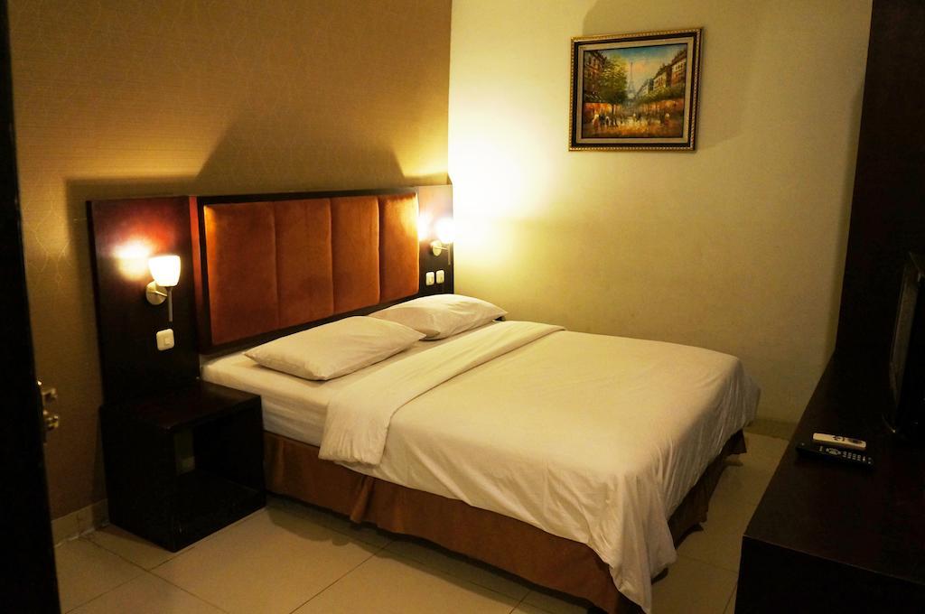 Feodora Airport Hotel Palembang Habitación foto